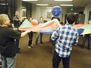 Image: Playing with a parachute at SKSF.